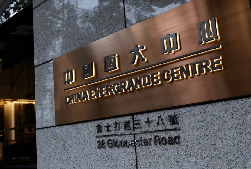 China Evergrande Averts Default Again but Debt Woes Mount