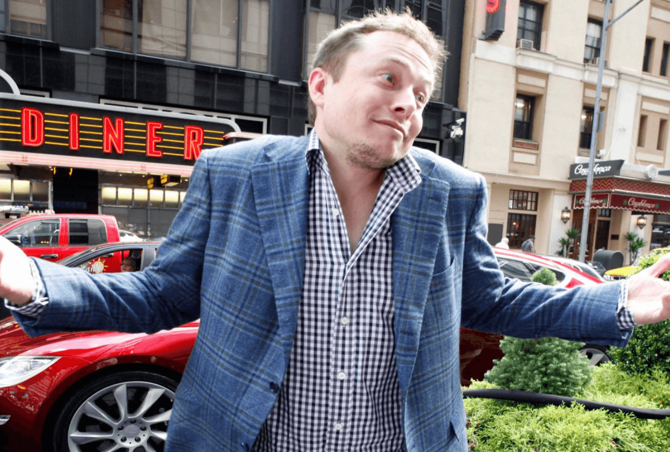 tesla is a goldman sachs top pick for 2022 the stock is dropping anyway