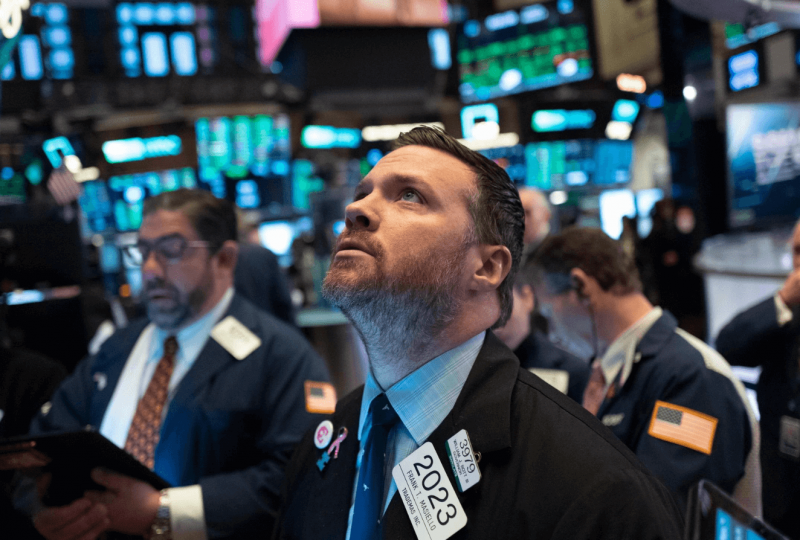 Stocks Dip As Investors Digest Hawkish Fed Remarks, Eye Sanctions